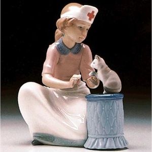 Lladro nurse, loving care, nurse and cat number 6087